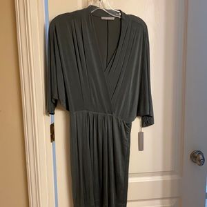 Fitted green dress with low neck line!